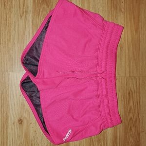 Pink reebok athletic shorts